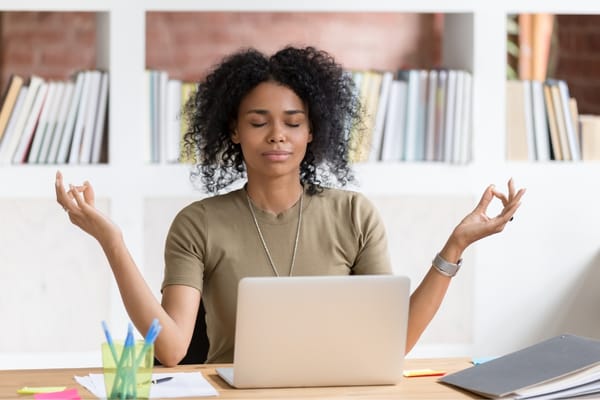 8 Ways To Meditate At Work Without Leaving Your Desk